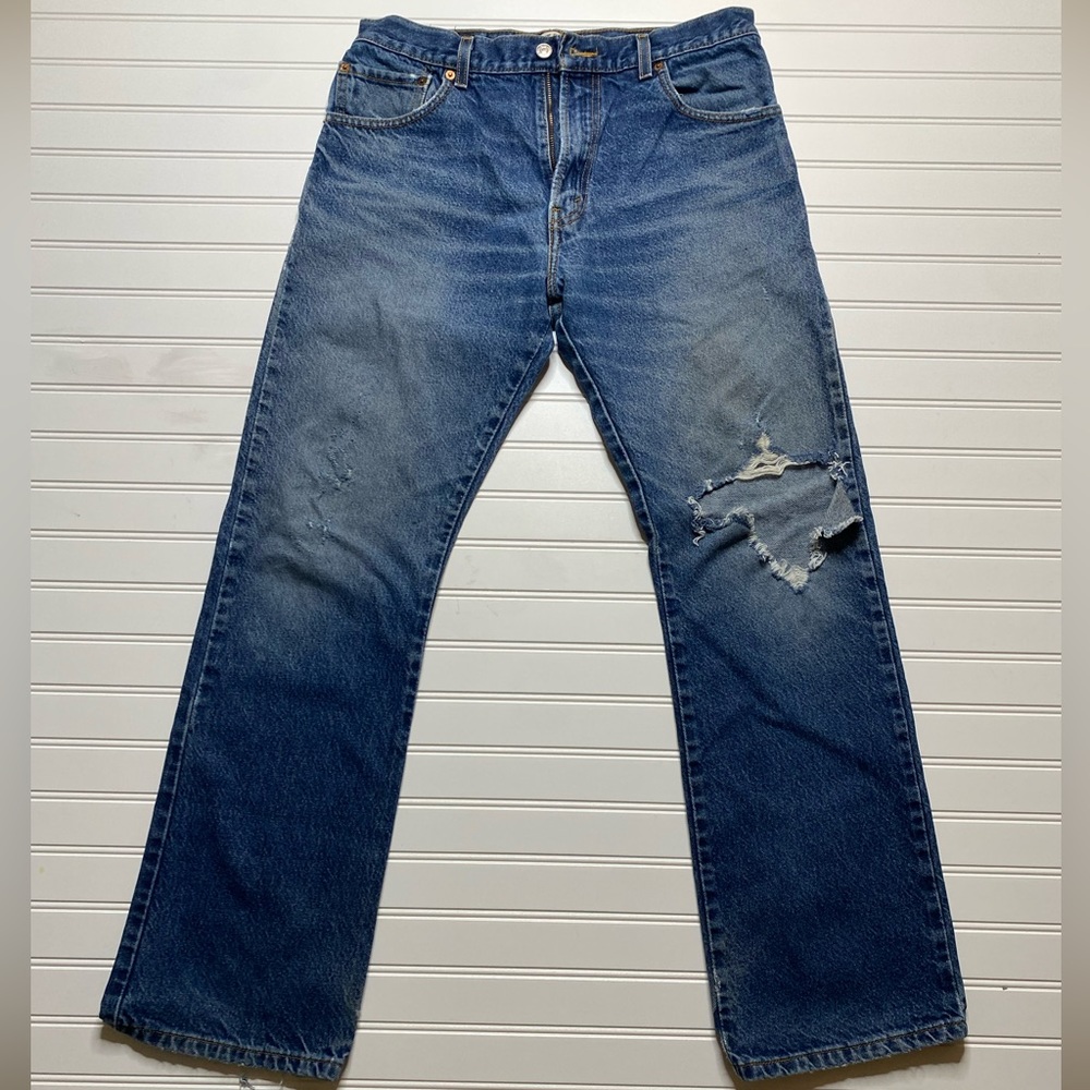Women’s Levi’s boot cut distressed/ripped jeans